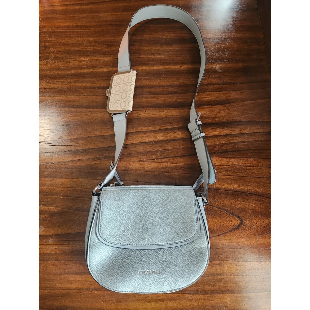 Light blue Calvin Klein Bella crossbody bag textured leather & sig coin purse